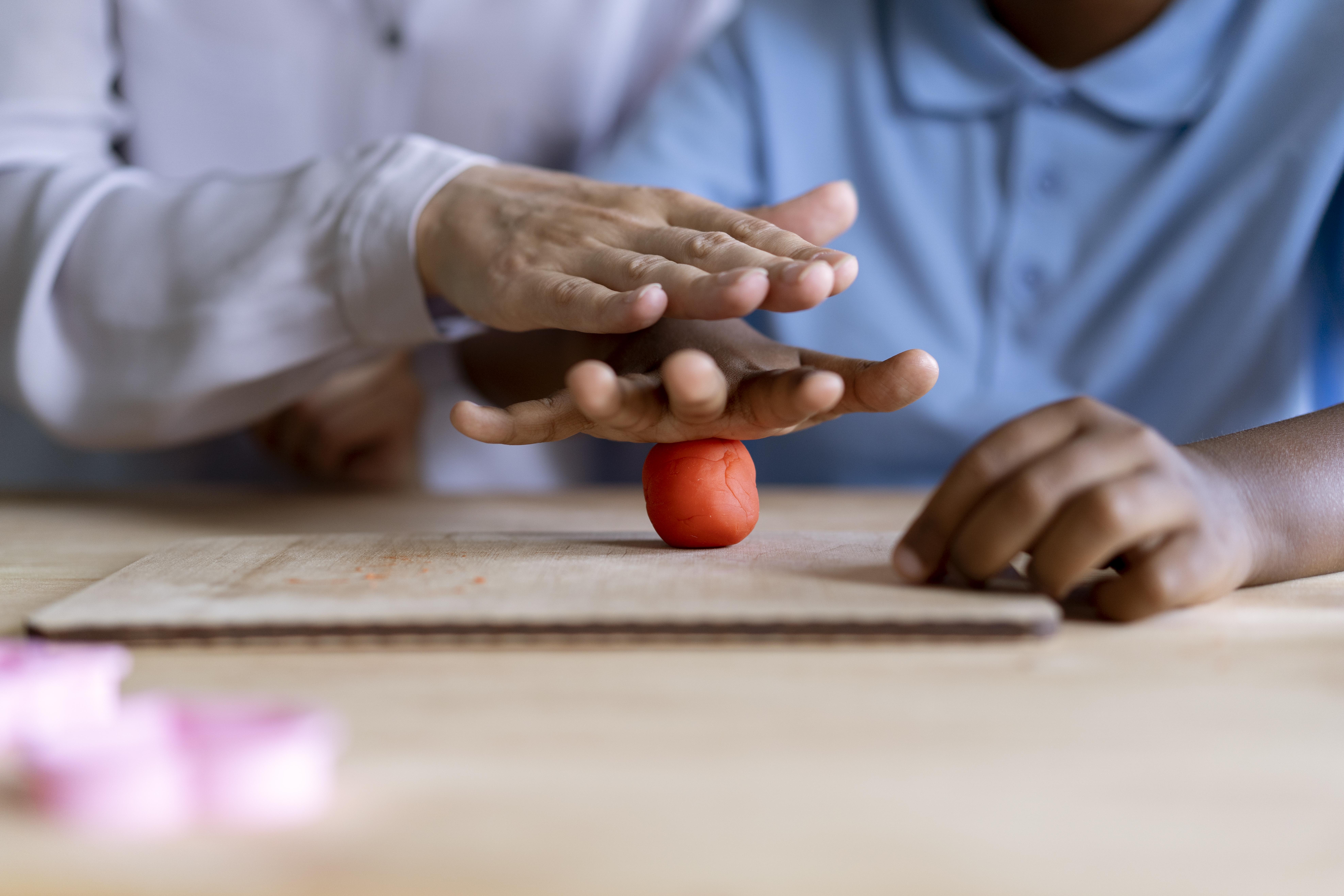boy-doing-occupational-therapy-session-with-psychologist